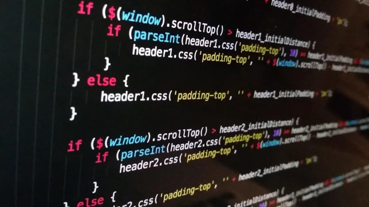 Close-up of JavaScript code in a dark code editor